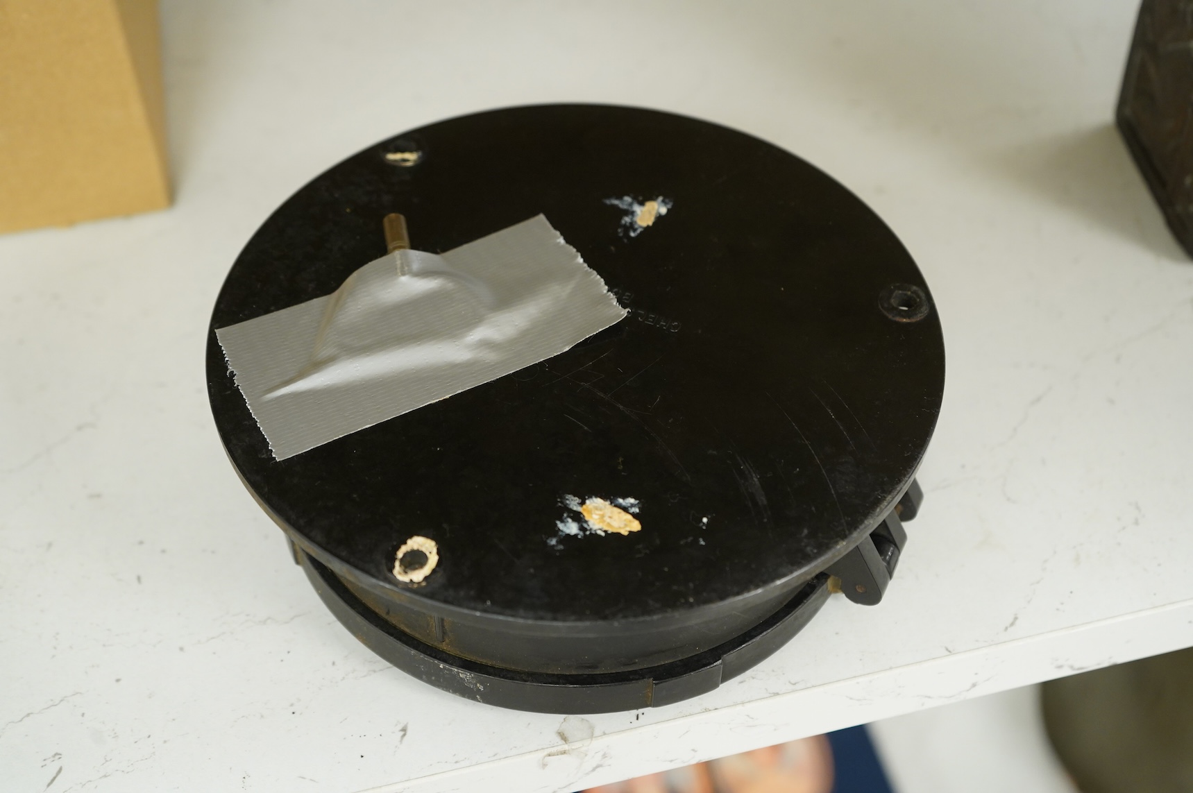 A U.S. Government Chelsea Clock Co., Boston, ship’s bulkhead clock in Bakelite case, diameter 17cm with key